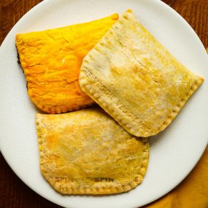 Delicious Jamaican patties on white plate Baytown TX